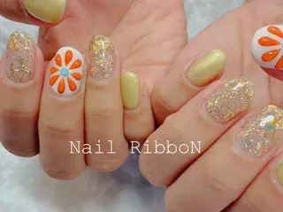 ネイル ネイルリボン 受付スタッフのマツエク・マツパデザイン