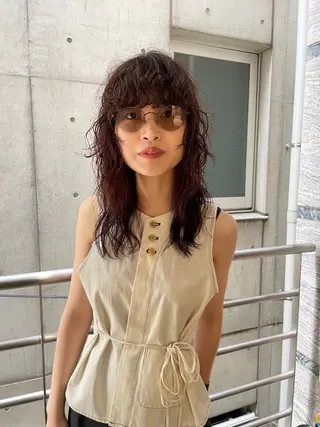 セミロング パーマ satsuki 暖色・ブラウンカラーのヘアスタイル