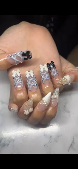 ネイル ｼﾝ ｻﾗﾝのネイルデザイン