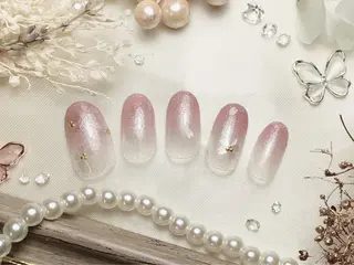 ミディアム ネイルPetit Ribbonのネイルデザイン