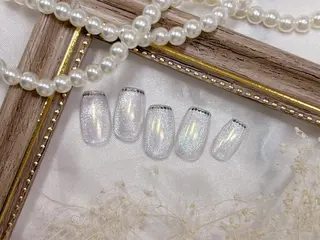 ネイル ネイルPetit Ribbonのネイルデザイン