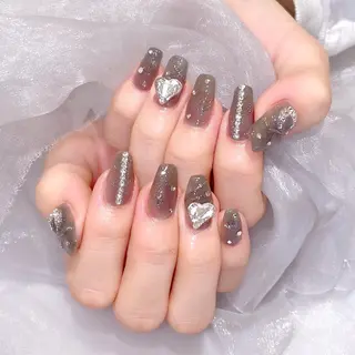 ネイル 𝘙𝘪𝘰𝘯𝘢 ...🕯🤍のネイルデザイン