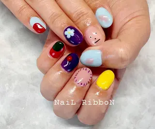 ネイル ネイルリボン 受付スタッフのマツエク・マツパデザイン