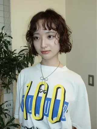 ショート ニュアンスパーマ レイヤーカットのヘアスタイル