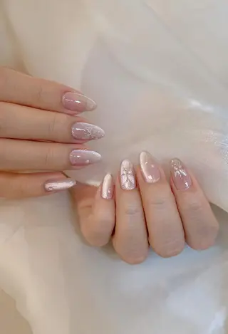 ネイル RAFFINE 月🦋🩵のネイルデザイン