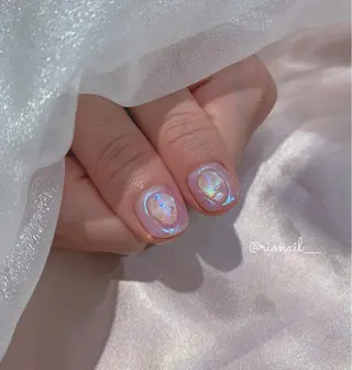 ネイル 𝘙𝘪𝘰𝘯𝘢 ...🕯🤍のネイルデザイン