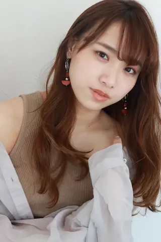 神塚 詩央里のヘアスタイル
