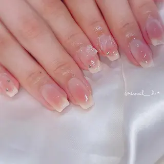 ネイル 𝘙𝘪𝘰𝘯𝘢 ...🕯🤍のネイルデザイン