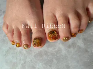 ネイル ネイルリボン 受付スタッフのマツエク・マツパデザイン