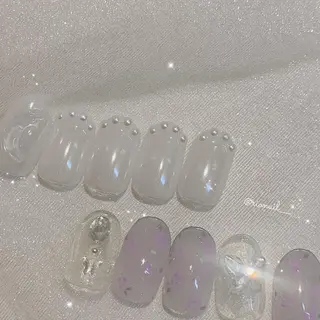 ネイル 𝘙𝘪𝘰𝘯𝘢 ...🕯🤍のネイルデザイン