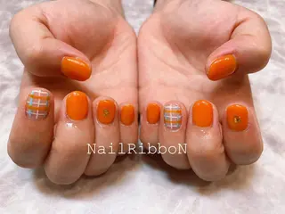 ネイル ネイルリボン 受付スタッフのネイルデザイン