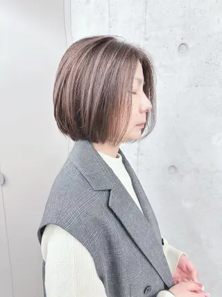 ミディアム とうい/パーマボブ/ くせ毛/丸みボブのヘアスタイル