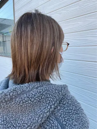 ミディアム ビヨウシツトリコ よねたにみなのヘアスタイル