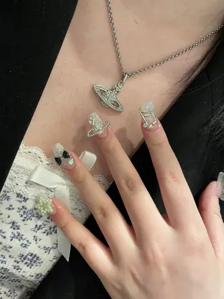 ロング m kaori𓃟のネイルデザイン