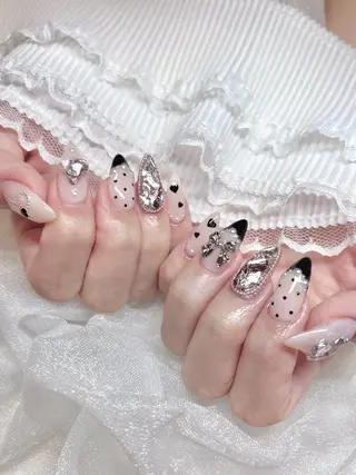 ネイル moca心斎橋店 Aina🐈‍⬛🤍のネイルデザイン