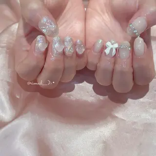 ネイル 𝘙𝘪𝘰𝘯𝘢 ...🕯🤍のネイルデザイン