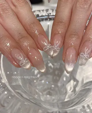 ネイル 𝘙𝘪𝘰𝘯𝘢 ...🕯🤍のネイルデザイン