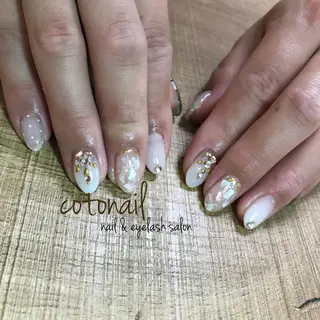 ミディアム ネイル ツメトマツゲ .のネイルデザイン