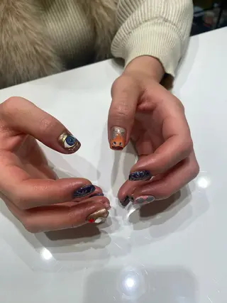 ネイル EARTH coiffure beaute 東松山店所属・町田 杏花のネイルデザイン