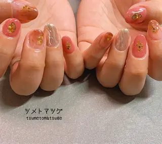 ミディアム ネイル ツメトマツゲ .のネイルデザイン