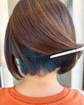 神塚 詩央里のヘアスタイル