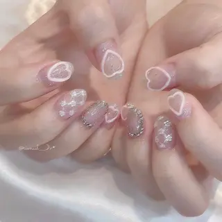 ネイル 𝘙𝘪𝘰𝘯𝘢 ...🕯🤍のネイルデザイン