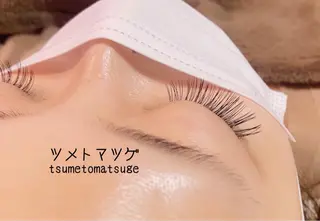 ミディアム ネイル ツメトマツゲ .のネイルデザイン