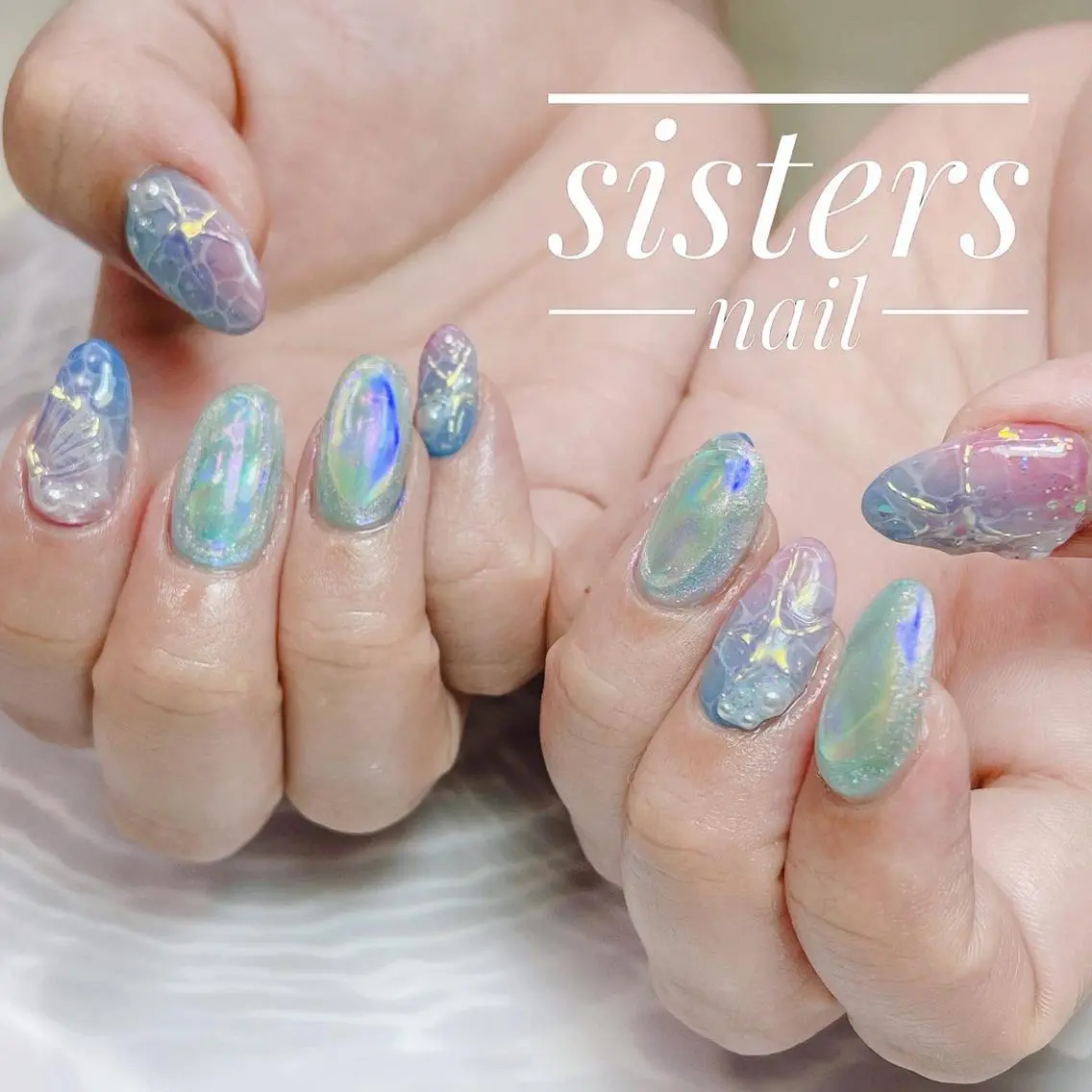 ネイル アートネイル オーロラネイル ブルー 氷ネイル・うるうるネイル キラキラネイル sisters nail.fのネイルデザイン
