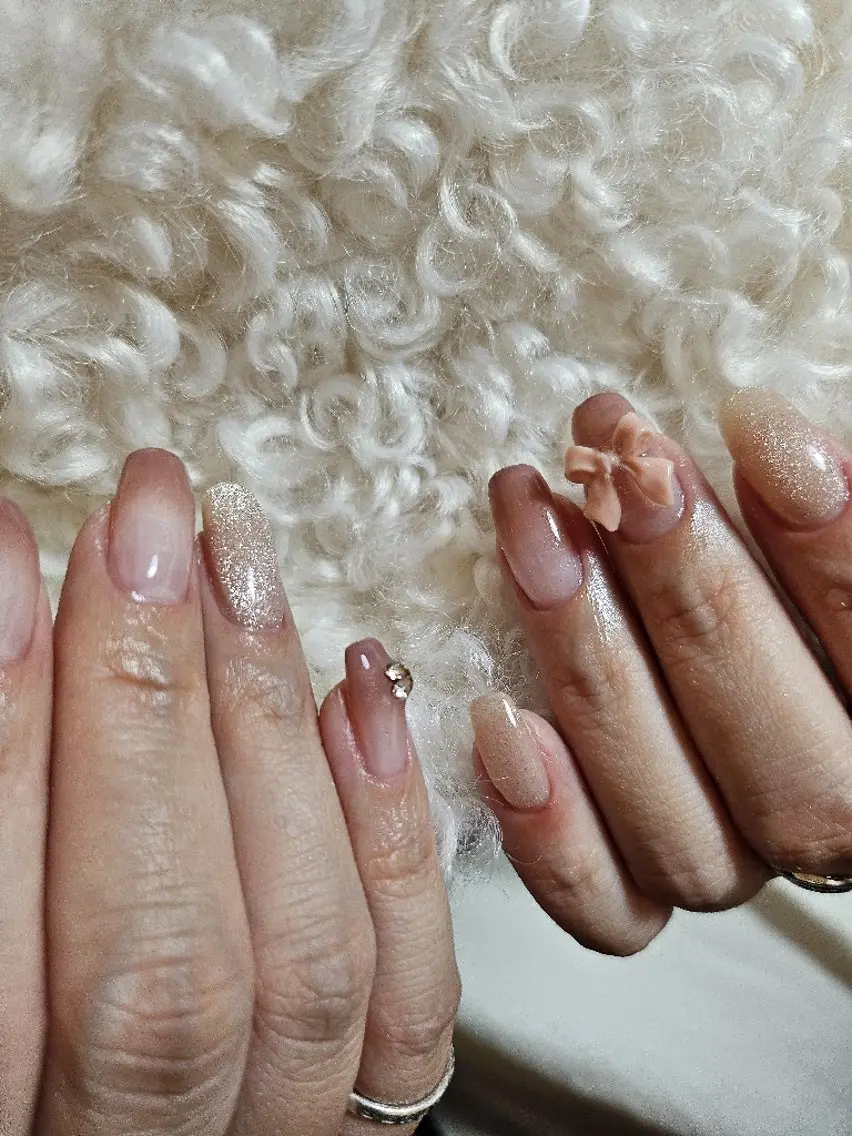 ネイル リボン Bijou. 【junjun.】のネイルデザイン