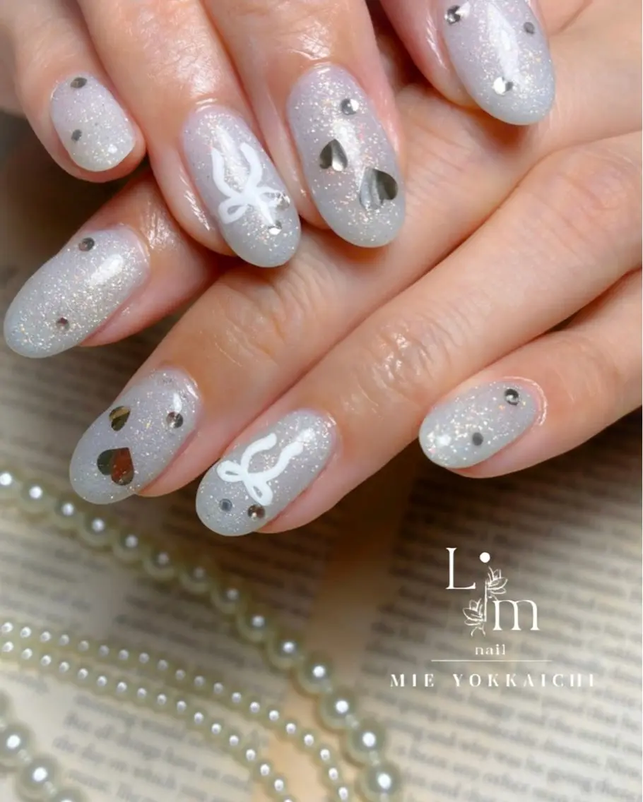 ネイル ブルー キラキラネイル リボン Li.m nail リム ネイルのネイルデザイン