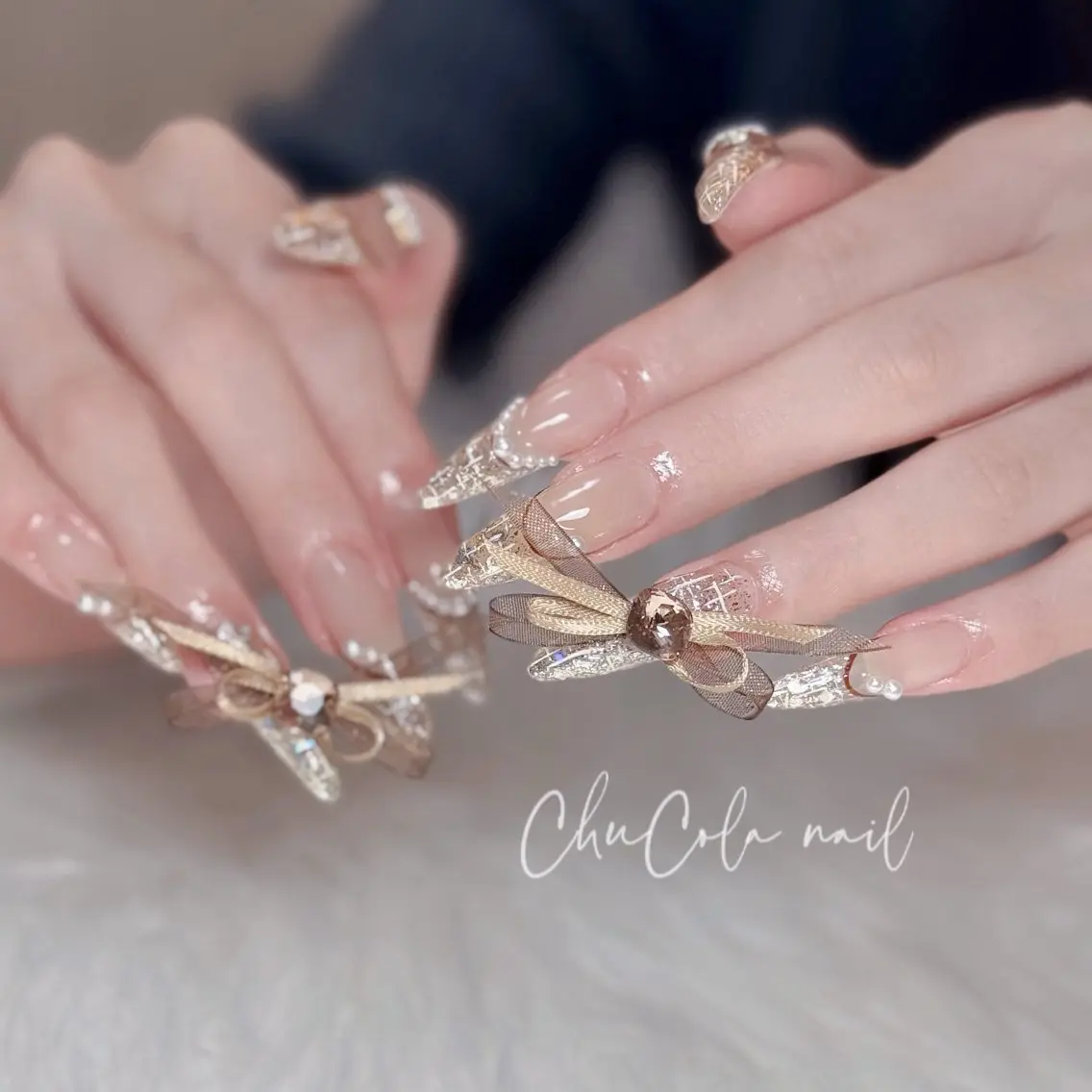 ネイル リボン ツイードネイル バレンタイン ワンホンネイル nailsalon ChuColaのネイルデザイン