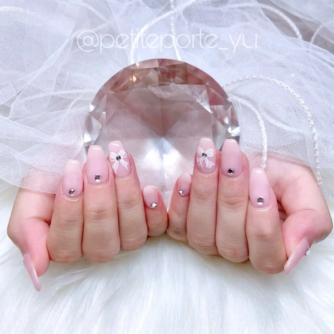 ネイル ジェルネイル ワンカラーネイル ピンク リボン シンプルネイル ハンドネイル petite porteのネイルデザイン