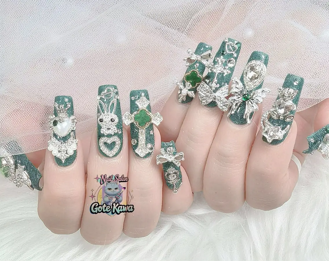 ネイル フラッシュネイル グリーン ハート キラキラネイル リボン ハンドネイル ハンドケア Gote Kawa nail salonのネイルデザイン