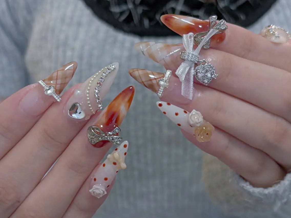 ネイル アニマル柄 べっ甲ネイル ボルドー ブラウン ジェルネイル ハンドネイル Belle Nail Salonのネイルデザイン