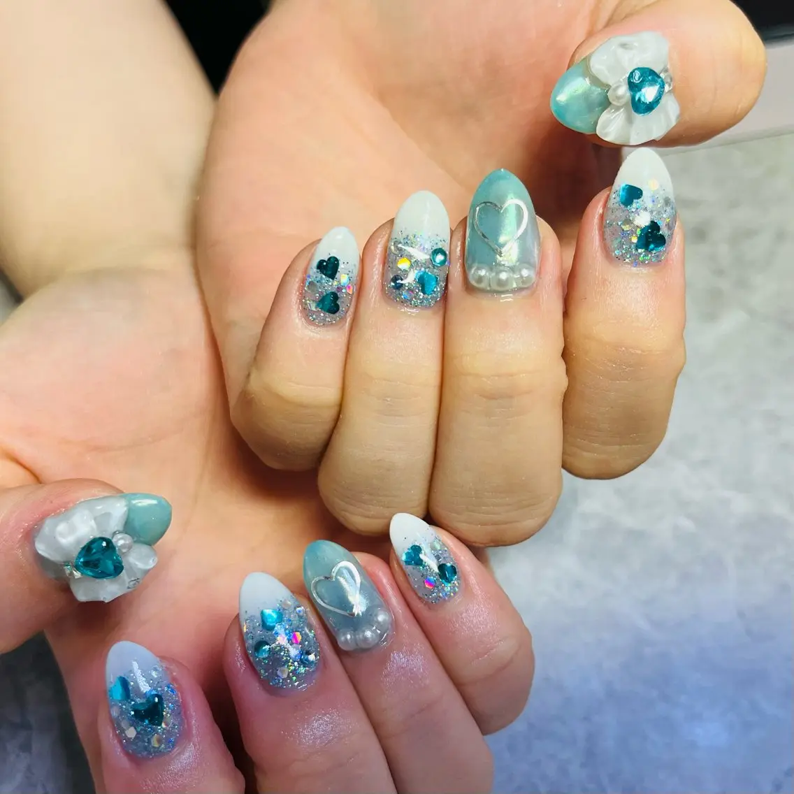 ネイル 水色 持ち込み リボン ハンドネイル ハンドケア ベテランネイル cnc  nailのネイルデザイン