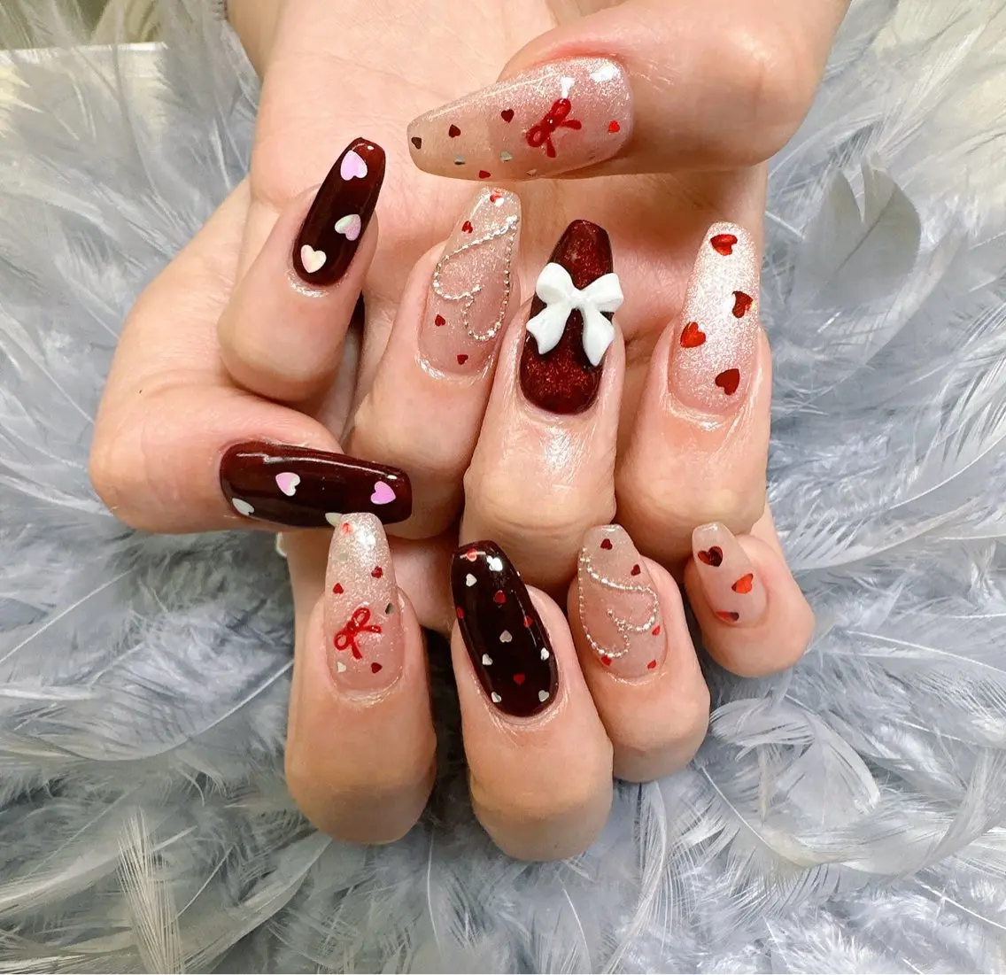 ネイル ハート リボン バレンタイン ハンドネイル Pretty Nail Salonのネイルデザイン