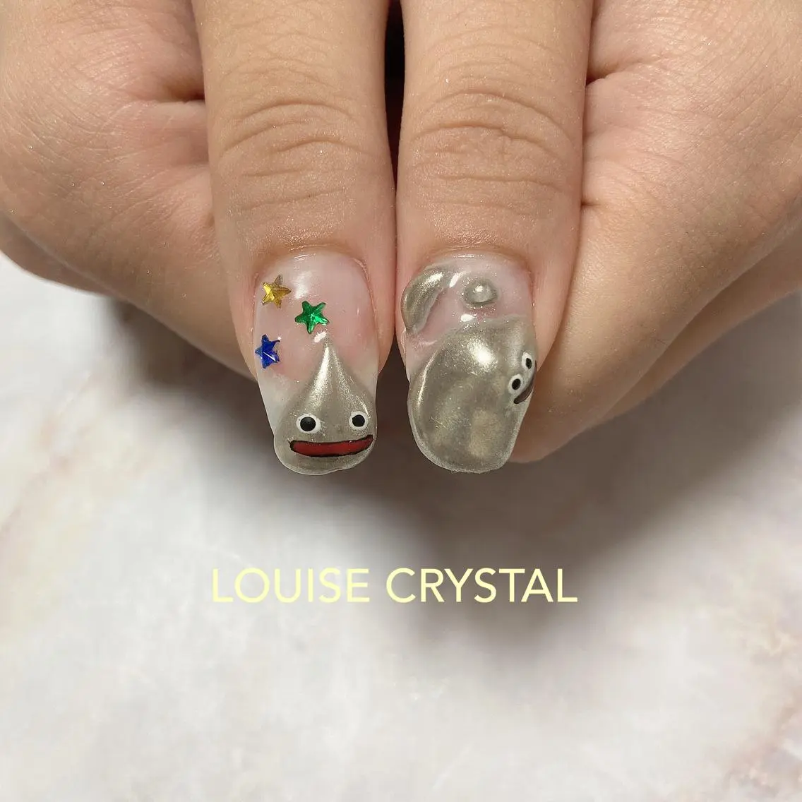 ネイル ハンドネイル LOUISE CRYSTALのネイルデザイン