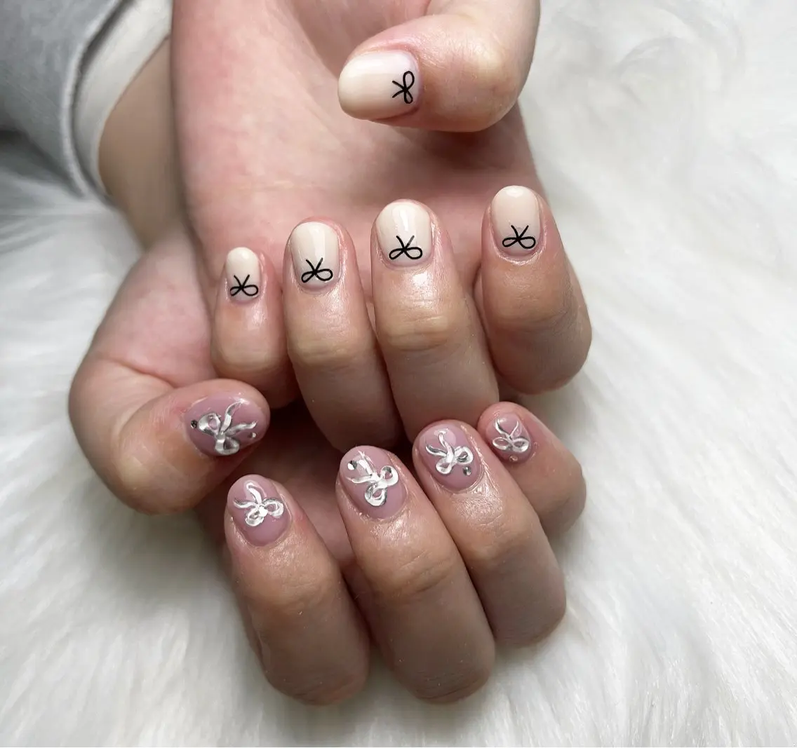 ネイル リボン #Amin nail salonのネイルデザイン