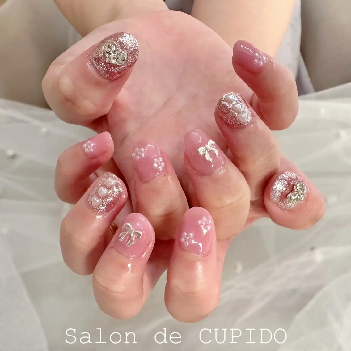 ネイル アートネイル ガーリー ピンク シルバー Salon de CUPIDOのネイルデザイン