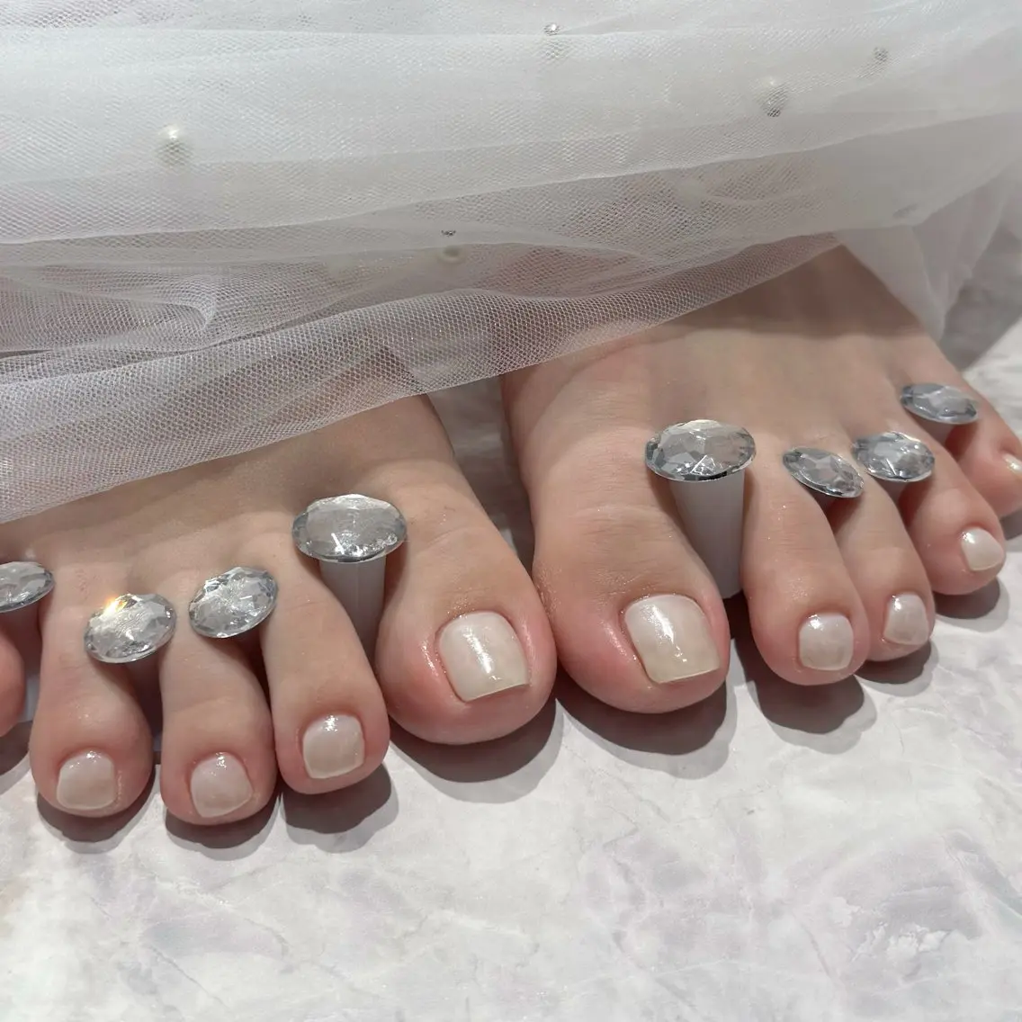 ネイル ミラーネイル ホワイト mau🩵 堺筋本町nailのネイルデザイン
