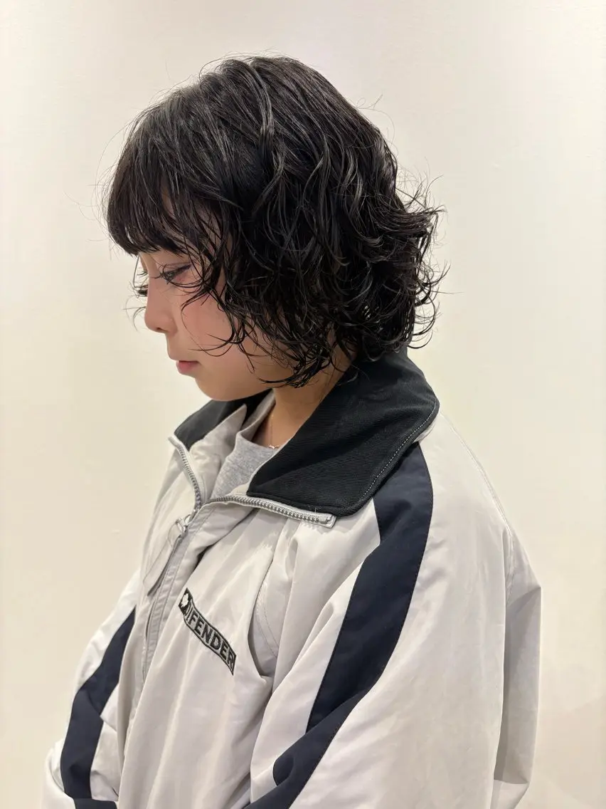 パーマ ヨシノ マナウのヘアスタイル