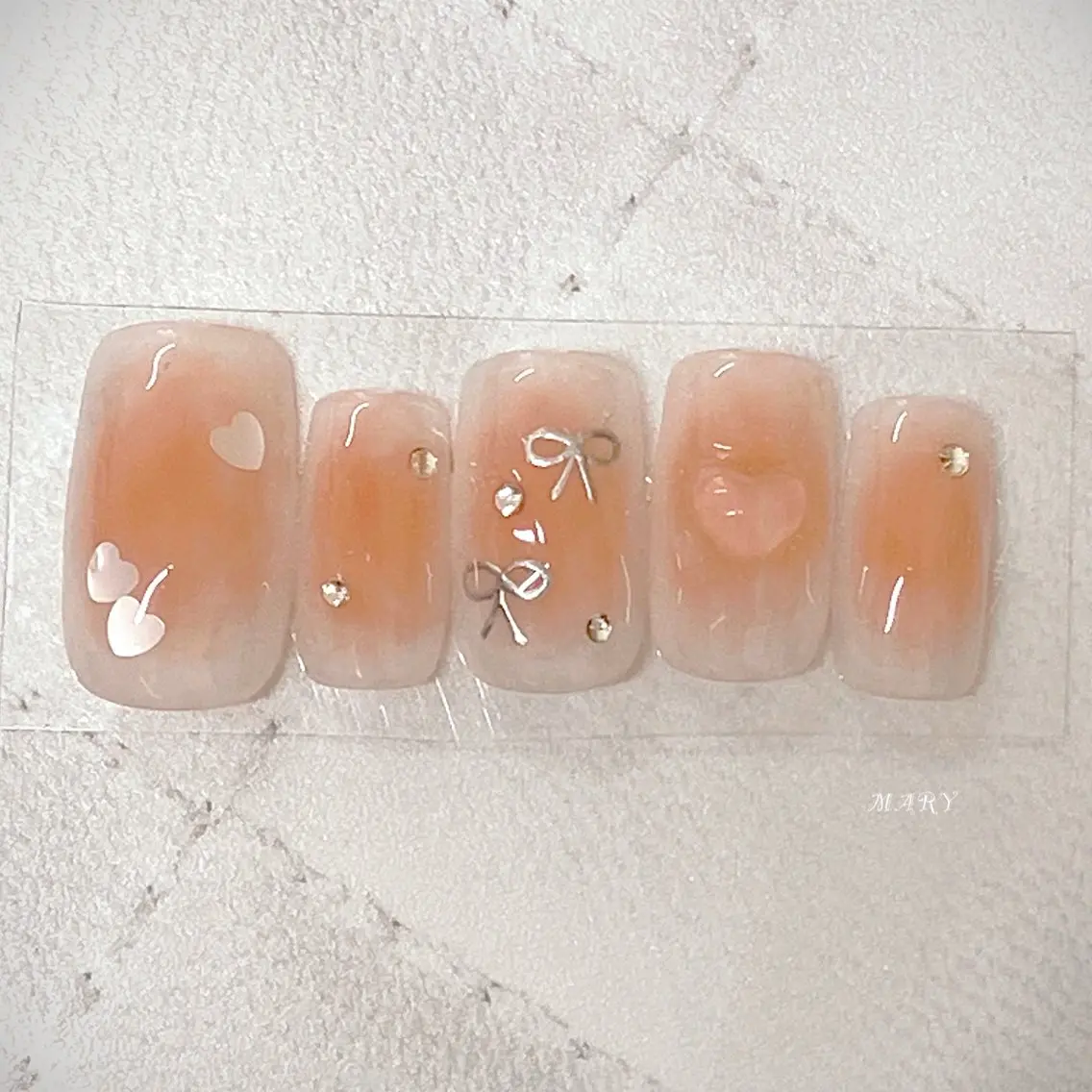 ネイル チークネイル ハート ニュアンスネイル ピンク リボン ハンドネイル Mary nail .narumiのネイルデザイン
