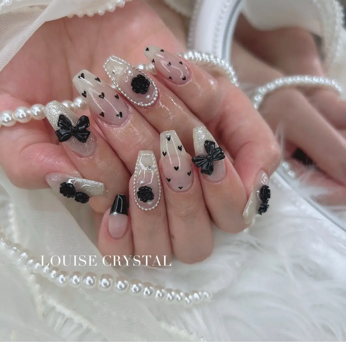 ネイル ハンドネイル LOUISE CRYSTALのネイルデザイン
