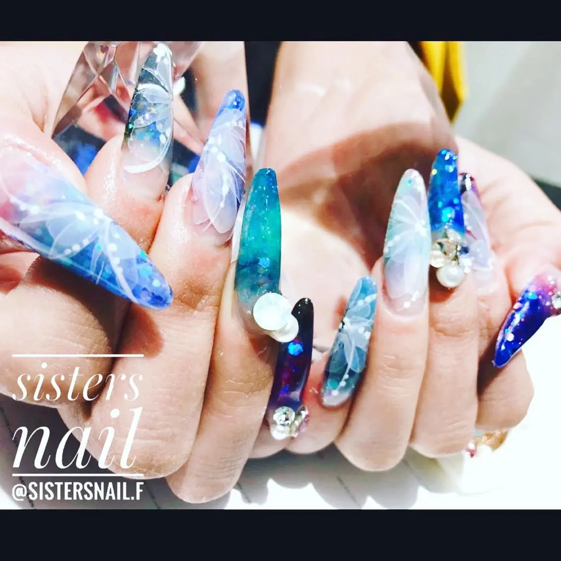 ネイル アートネイル ブルー クリアネイル 成人式 フラワーネイル sisters nail.fのネイルデザイン