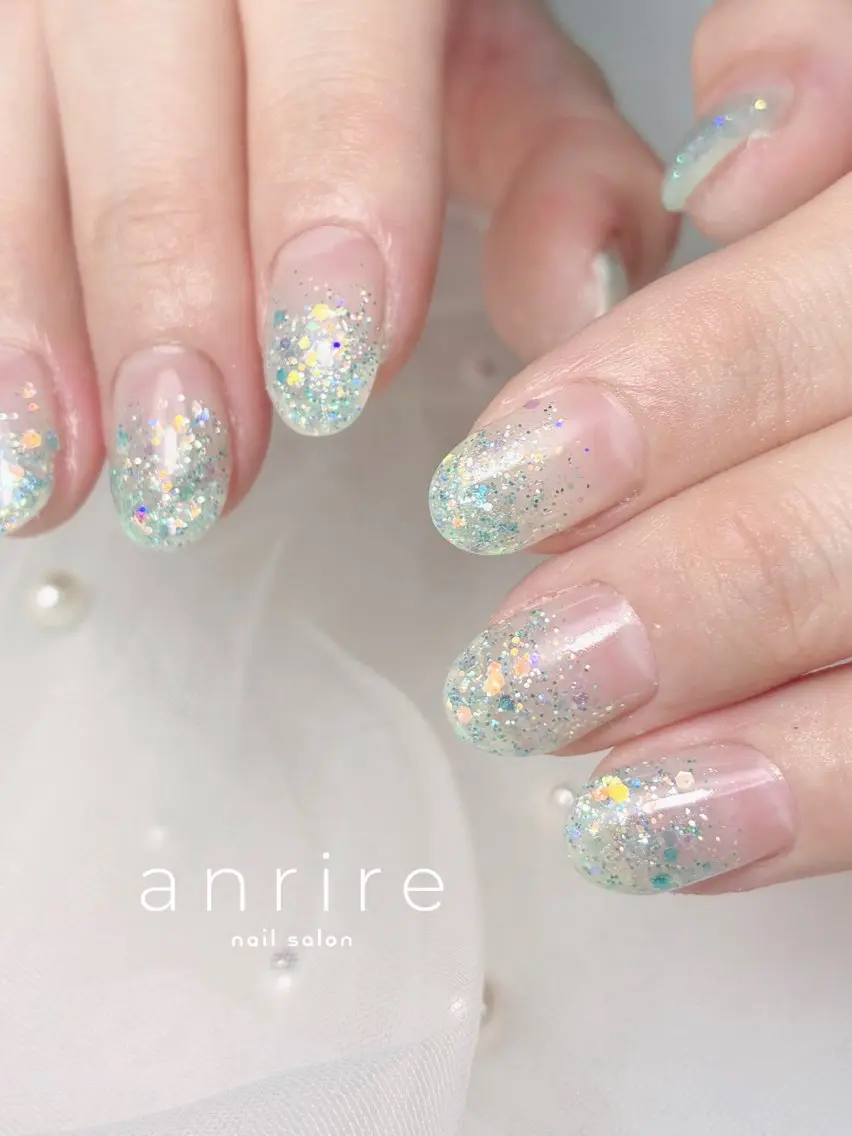 ネイル グラデーション キラキラネイル ラメ(グリッター) ラメグラデーション 水色 ハンドネイル nailsalon anrireのネイルデザイン