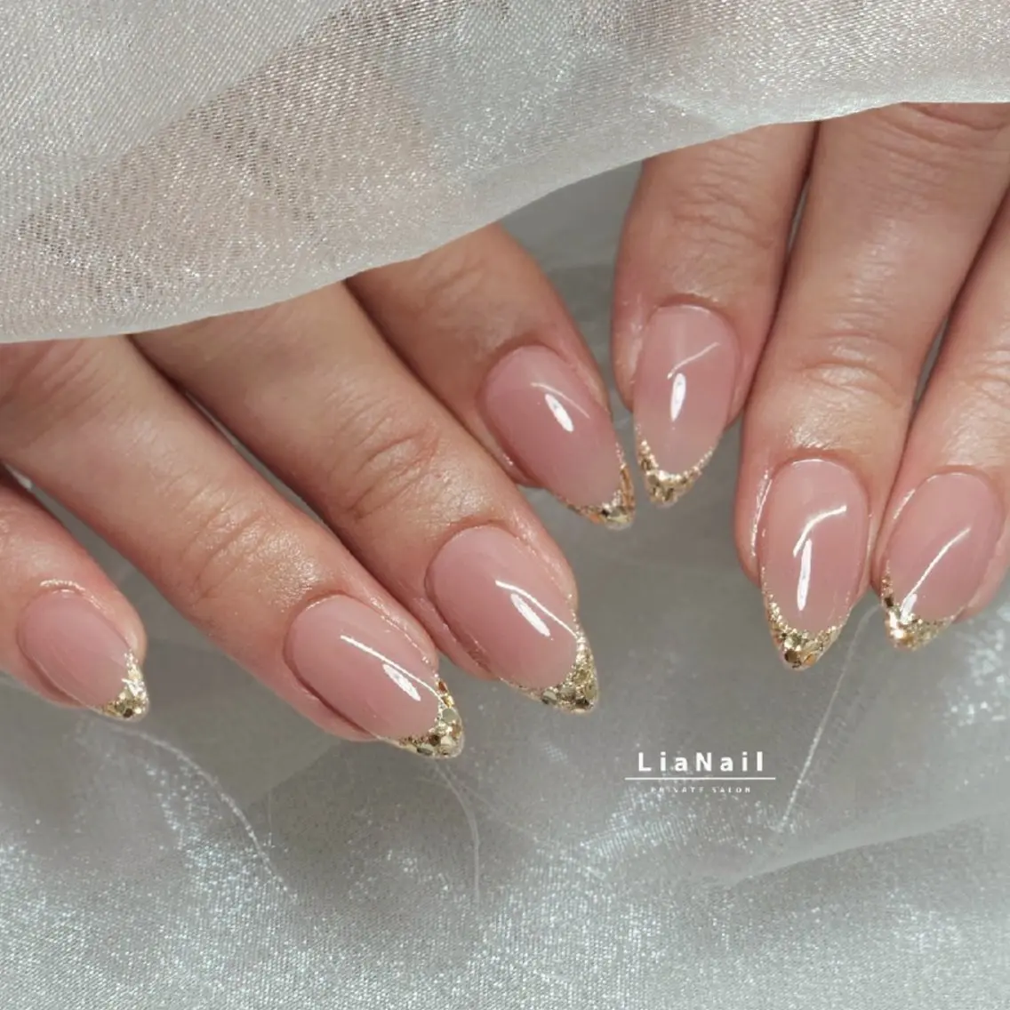ネイル フレンチネイル ガラスフレンチ ラメ(グリッター) ハンドネイル Lia Nailのネイルデザイン