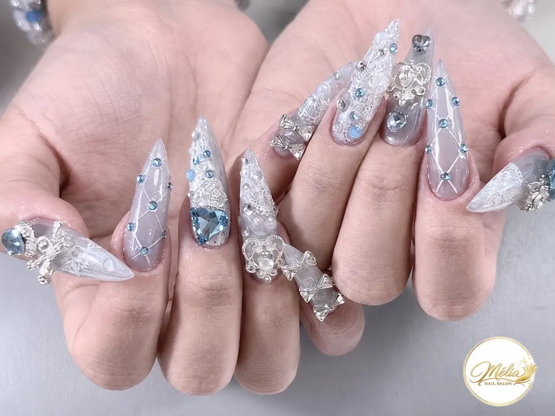 ネイル ブルー クリアネイル キラキラネイル レース ロングネイル ハンドネイル ハンドケア Melia Nailsのネイルデザイン
