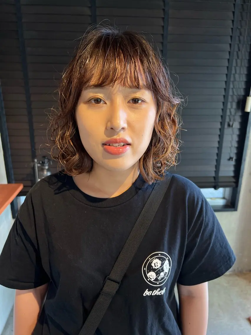 パーマ 乕谷 美潮のヘアスタイル