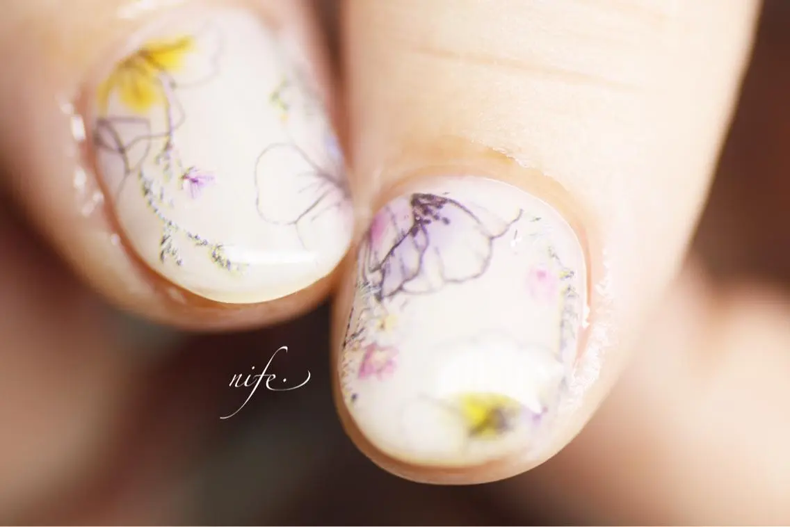 ネイル アートネイル フラワーネイル ワンカラーネイル 春ネイル atelier nife.のネイルデザイン