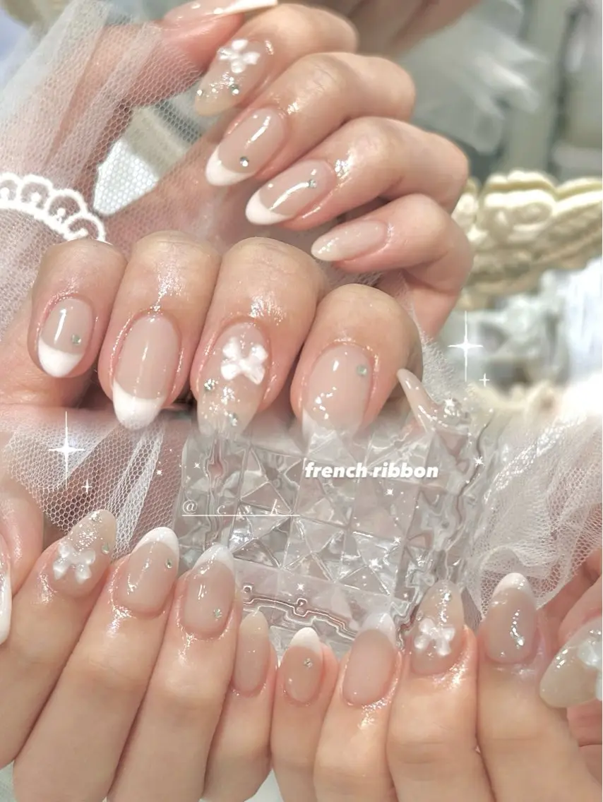 ネイル リボン ハンドネイル 🎀チーク/ちゅるん 🫧chisa🎀のネイルデザイン
